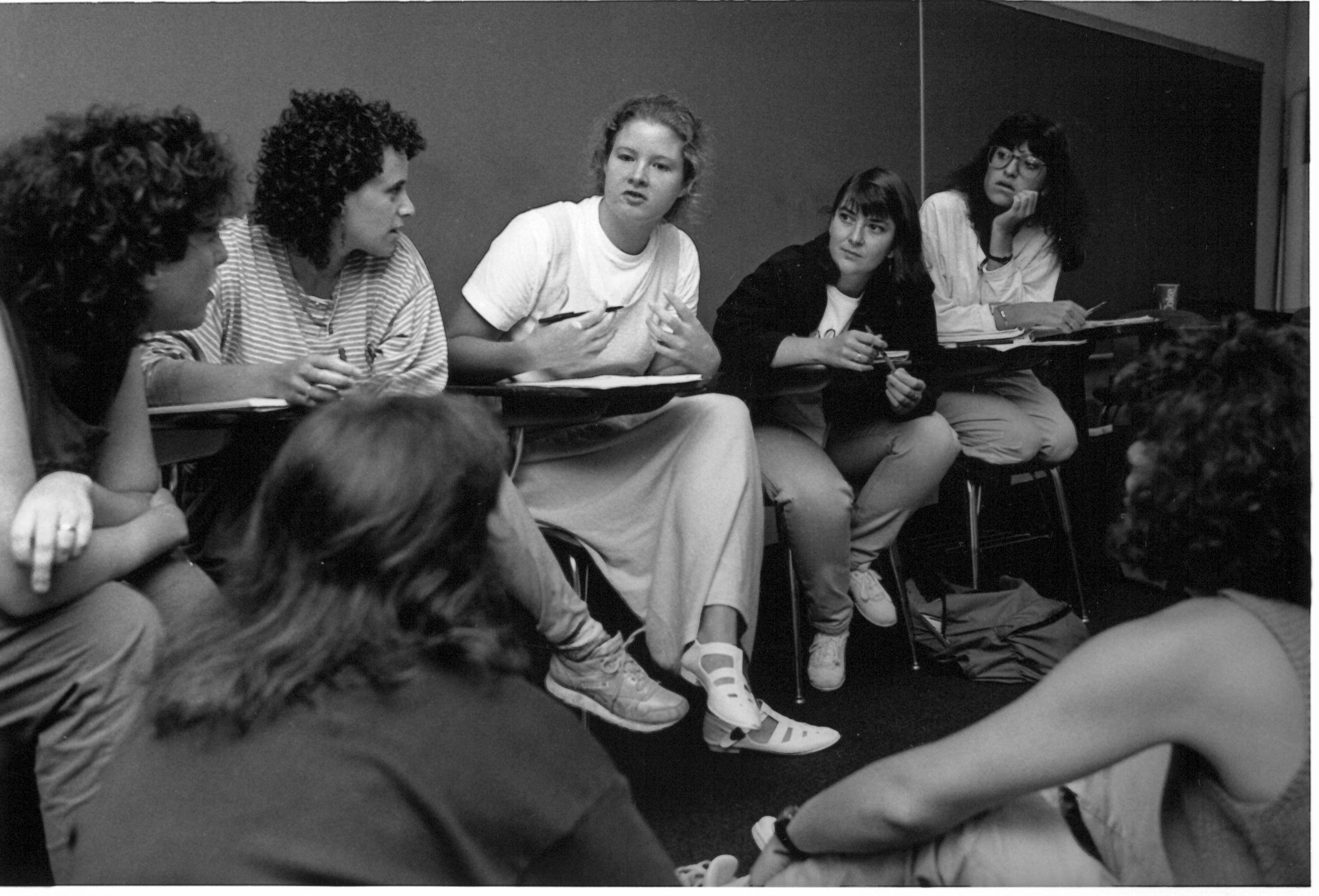 Black and white photo of classroom discussion